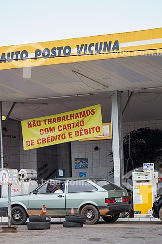 Cartaz de posto de gasolina