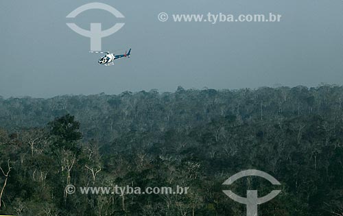  Helicóptero do Núcleo de Operações e Transporte Aéreo - NOTAer/Polícia Militar transportando de bombeiros durante incêndio na Reserva Biológica de Sooretama  - Sooretama - Espírito Santo (ES) - Brasil
