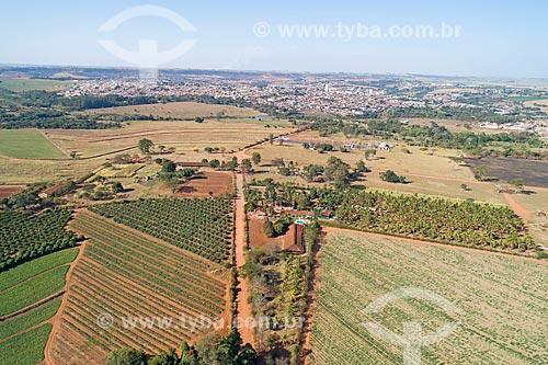  Foto feita com drone de fazenda com a cidade ao fundo  - Taquaritinga - São Paulo (SP) - Brasil