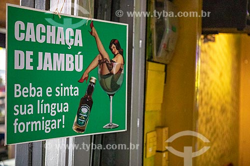  Detalhe de placa de publicidade com os dizeres: Cachaça de Jambu beba e sinta sua língua formigar! em bar no Centro Luiz Gonzaga de Tradições Nordestinas  - Rio de Janeiro - Rio de Janeiro (RJ) - Brasil