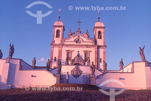  Fachada do Santuário de Bom Jesus de Matosinhos (1757) durante o pôr do sol - década de 80  - Congonhas - Minas Gerais (MG) - Brasil