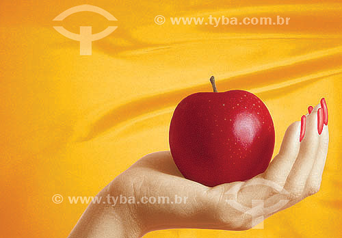  Woman`s hand holding apple 