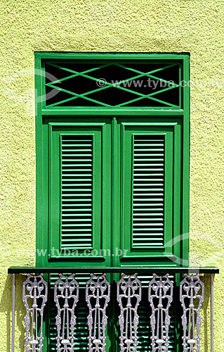  Architectural detail, painted shutters and window on the facade of an old house - Aracati city* - Ceara state - Brazil  * The architectural joint of the city is a National Historic Site since 10-31-2001. 