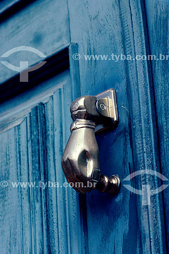  Architectural detail, door knocker, latch on a closed hand shape - Brazil 