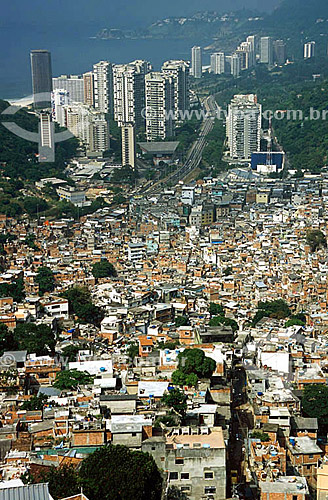  Favela da Rocinha Slum in the foreground and Sao Conrado neighbourhood buildings in the background - Rio de janeiro city - Rio de janeiro state - Brazil 