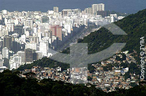  Aerial view of Ipanema buildings neighborhood with the poor houses of the Rocinha Slum in the foreground - Rio de Janeiro city - Rio de Janeiro state - Brazil 