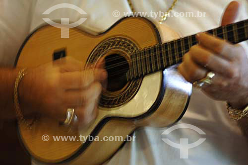  Man playing small guitar - Conservatoria - Rio de Janeiro state - Brazil 