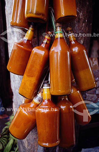  Bottles with Dende olive oil (palm olive oil, used at bahian cuisine) - Mercado Sao Joaquim Market  - Salvador city - Brazil