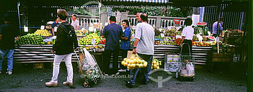  People buying fruits in a street fair - Brazil 