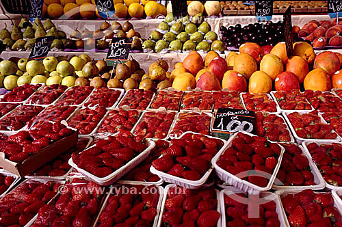  Fruits to sell (strawberry, mango, apple, pear,  plum, etc.) in a street fair - Brazil 