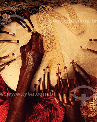  Artcraft: Detail of a black hand weaving lace*  *A Brazilian adaptation of bobbin lace 