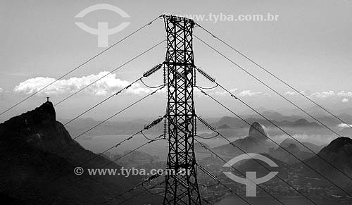  Transmission tower in the foreground with the Christ the Redeemer in the background at the left side - Rio de Janeiro city - Rio de Janeiro state - Brazil 