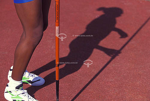  Javelin Throw - detail of the legs of the athlete 