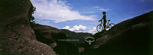  Sport - man on the mountains with his bike 