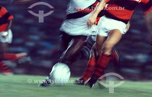  Soccer game (Flamengo x Vasco) - detail of the the players kicking the ball 