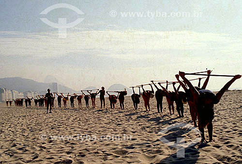  Sports - Gym - People working out at the beach 