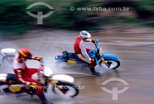 Motorcycling / Motocross - pilots on the moto during the race 