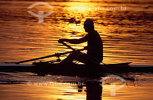  Silhouette of man rowing at the sunrise - Rodrigo de Freitas Lagoon* - Rio de Janeiro city - Rio de Janeiro state - Brazil  * Its a National Historic Site since 06-19-2000. 