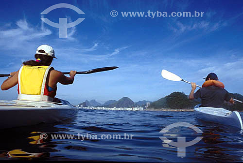  Canoeing - men rowing on Guanabara Bay, with Copacabana Beach in the background - Rio de Janeiro city - Rio de Janeiro state - Brazil 