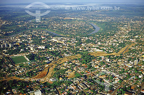  Aerial view of the city of Rio Branco showing the Acre River and the construction site of the 