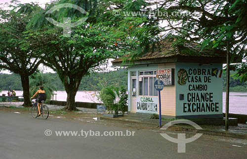  Currency exchange - National border mark between Brazil and French Guyana - Oiapoque town - Amapa state - Brazil 