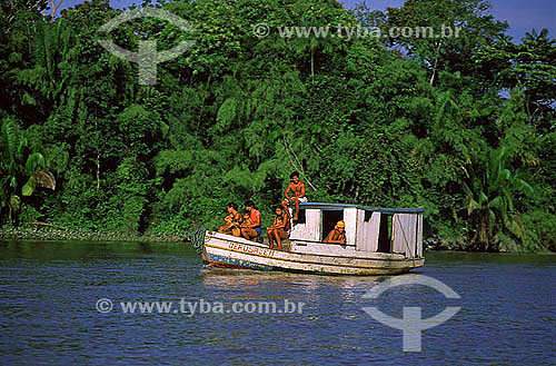  Family in boat at Amazonas river - Mazagao county - Amapa state - Brazil 