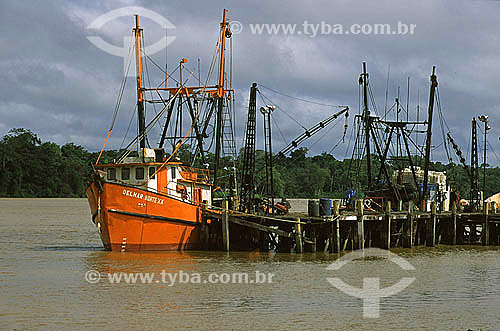  Fishing boat anchored at Matapi River pier, the river divide Mazagao county and Santana county - Amapa state - Brazil 