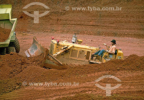  Worker using a tractor during the 