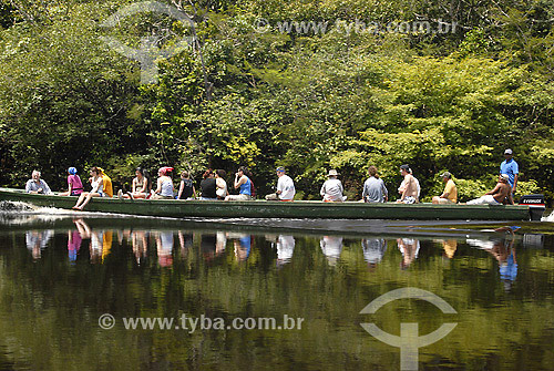  Tourists on boat at Ariau river - Amazonas state - Brazil 