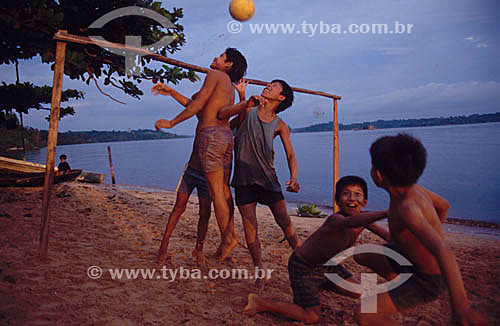  Boys playing soccer on Sao Gabriel da Cachoeira Beach - Rio Negro (Black River) - Amazonas state - Brazil 