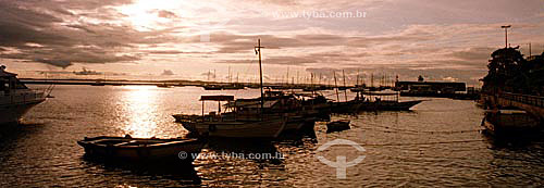 Silhouette of boats on Baía de Todos os Santos (All Saints Bay) with Forte São Marcelo (San Marcelo Fort) to the right in the background - Salvador city  - Bahia state - Brazil  