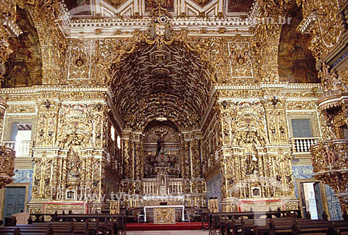  Architectural detail - The main altar carved in wood covered with gold with sacred images  inside the 