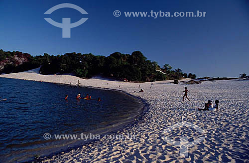  People at Lagoa de Abaeté (Abaete Lagoon), a black freshwater lagoon - Salvador city - Bahia state - Brazil 