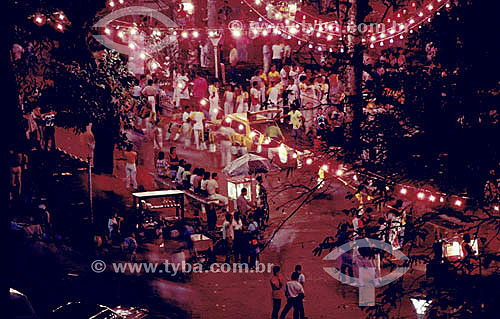  A party night in Salvador city with people on the streets illuminated with lamps - Bahia state - Brazil 