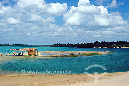  A hut with hammocks and tables on a sandbar in Lagoa da Tatajuba (Tatajuba Lagoon) - Jericoacoara - Ceara state - Brazil 