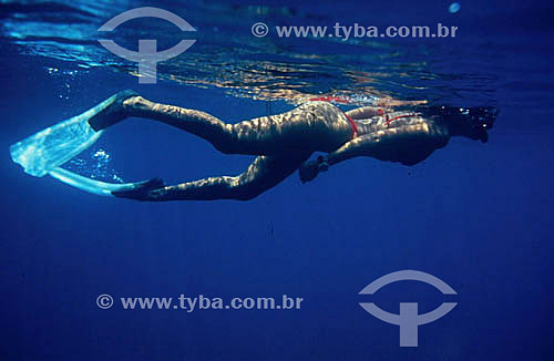  Woman practising scuba diving (mask, fins and snorkel) - Fernando de Noronha Island - Pernambuco state - Brazil 