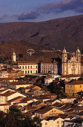  Ouro Preto (1) city at sunset with the Inconfidencia Museum to the left in the background and the Igreja de Nossa Senhora do Carmo Church (2) to the right - Minas Gerais - Brazil      (1) The city is a UNESCO World Heritage Site since 05-09-1980.    