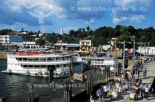  Anchorared boats and people at the port at Oriximina city - Para state - Brazil 