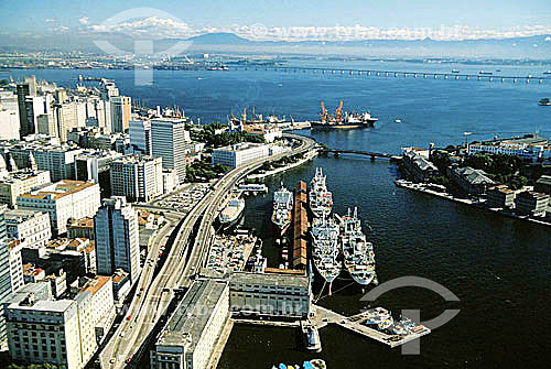  Aerial view of Rio de Janeiro city downtown, showing part of the harbor (in the foreground), and the Rio-Niteroi Bridge in the background - Rio de Janeiro city - Rio de Janeiro state - Brazil 