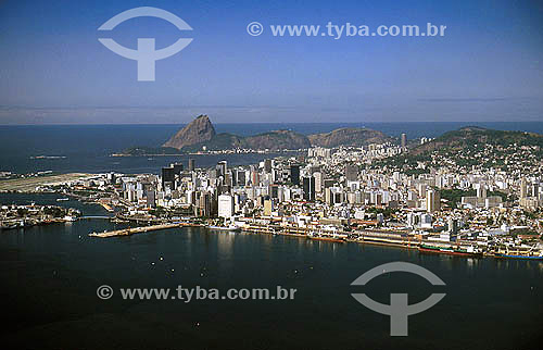  Aerial view  of Rio de Janeiro city downtown with part of the harbor in the foreground, and the Santos Dumont Airport in the left and Sugar Loaf Mountain in the background - Rio de Janeiro state - Brazil  *Commonly called Sugar Loaf Mountain, the en 