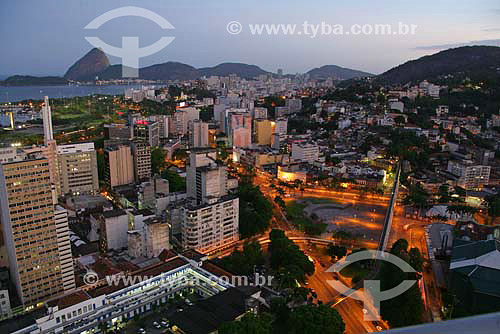  View of Rio de Janeiro city downtown at sunset, showing buildings in the foreground and the Sugar Loaf Mountain in the background - Rio de Janeiro city - Rio de Janeiro state - Brazil   