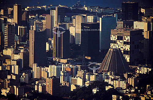  Aerial view of Rio de Janeiro city downtown, showing the conical Cathedral of Sao Sebastiao do Rio de Janeiro or Metropolitan Cathedral (to the right) and the Petrobras and BNDES buildings directly behind the cathedral - Rio de Janeiro city - Rio de 