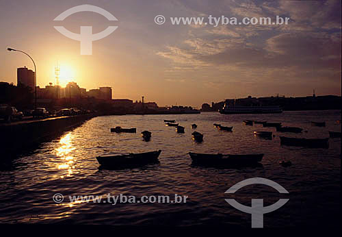  Boats Silhouette in the foreground and a Rio-Niterói ferry to the right at sunset - 