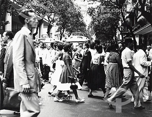  Historical scene of urban life of Rio de Janeiro city in 1957 - people crossing the Rio Branco Avenue - center of Rio de Janeiro city - Rio de Janeiro state - Brazil 