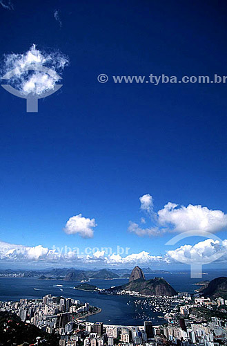  Overview of Sugar Loaf Mountain* and the entrance to Guanabara Bay with buildings along Botafogo Beach in the foreground and the city of Niteroi in the background - Rio de Janeiro city - Rio de Janeiro state - Brazil  *Commonly called Sugar Loaf Mou 