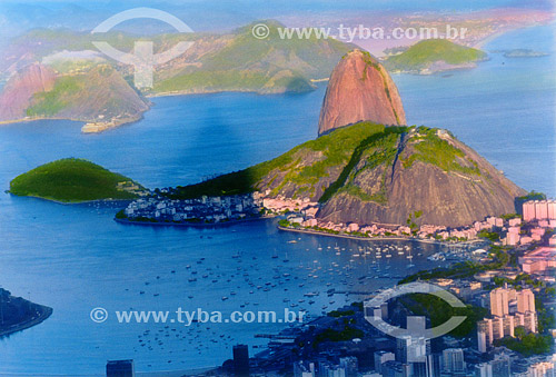  Sugar Loaf Mountain* - shadow of the Cristo Redentor (Christ the Redeemer) - Rio de Janeiro city - Rio de Janeiro state - Brazil *Commonly called Sugar Loaf Mountain, the entire rock formation also includes Urca Mountain and Sugar Loaf itself (the t 