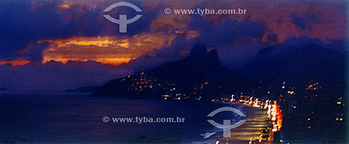  The sun sets on Ipanema Beach and Morro Dois Irmaos (Two Brothers Mountain)* - Rio de Janeiro city - Rio de Janeiro state - Brazil  * The Two Brothers Mountain is a National Historic Site since 08-08-1973. 