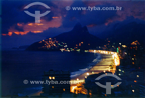  The sun sets on Ipanema Beach and Morro Dois Irmaos (Two Brothers Mountain)* - Rio de Janeiro city - Rio de Janeiro state - Brazil  * The Two Brothers Mountain is a National Historic Site since 08-08-1973. 