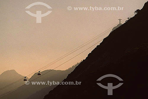  Sugar Loaf (*) trams and Crist the Redeemer statue in the background seen from Guanabara Bay - Rio de Janeiro city - Rio de Janeiro state - Brazil  *Commonly called Sugar Loaf Mountain, the entire rock formation also includes Urca Mountain and Sugar 