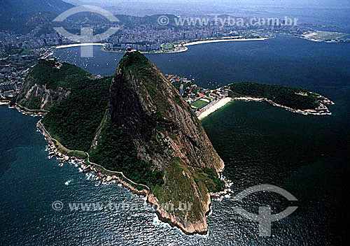  Aerial view of Sugar Loaf Mountain showing a beach area belonging to the Brazilian Army and Morro Cara de Cão (Dog Face Mountain) in the foreground, and from left to right in the background: Botafogo Beach, Flamengo Beach and Santos Dumont Airport  - Rio de Janeiro city - Rio de Janeiro state - Brazil